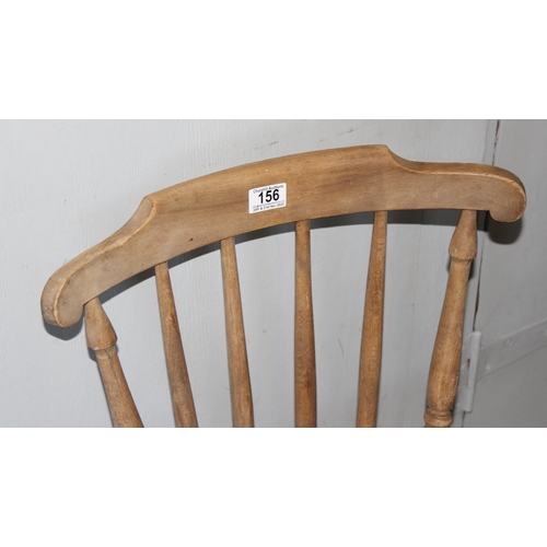 156 - An antique penny seated chair with stick back