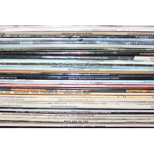 621 - 3 boxes of LP's to include Huey Lewis and the news, Rod Stuart and Rick Astley