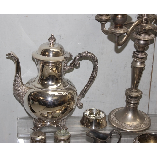 1011 - A large qty of assorted mixed metalware, mainly silver plate with some pewter to inc a 5 branch cand... 