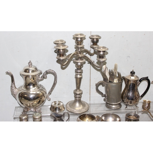 1011 - A large qty of assorted mixed metalware, mainly silver plate with some pewter to inc a 5 branch cand... 