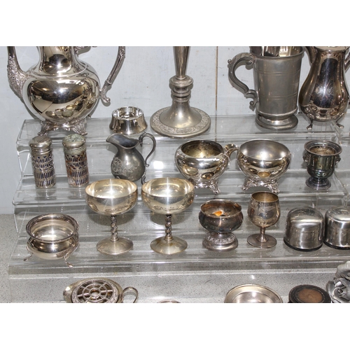 1011 - A large qty of assorted mixed metalware, mainly silver plate with some pewter to inc a 5 branch cand... 