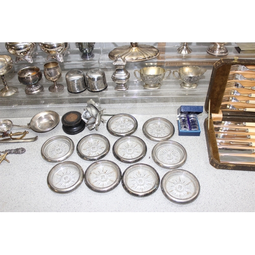 1011 - A large qty of assorted mixed metalware, mainly silver plate with some pewter to inc a 5 branch cand... 