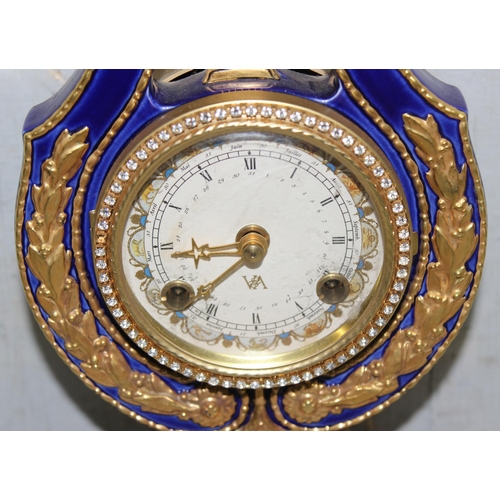 1305 - 20th century V&A Marie Antionette lyre clock - Blue porcelain with gilt mounts on an oval stepped ba... 