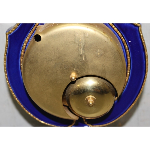 1305 - 20th century V&A Marie Antionette lyre clock - Blue porcelain with gilt mounts on an oval stepped ba... 