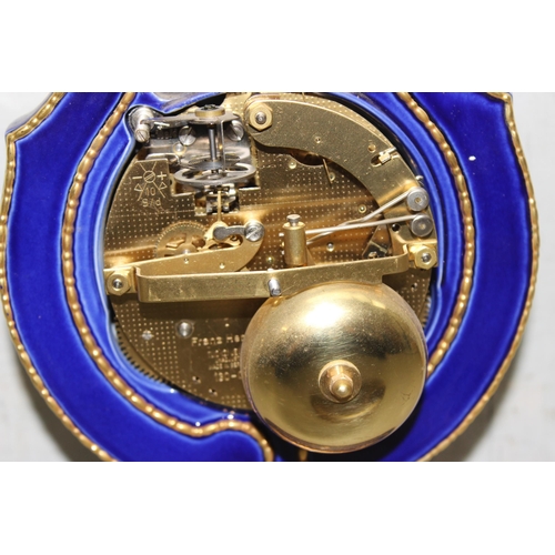 1305 - 20th century V&A Marie Antionette lyre clock - Blue porcelain with gilt mounts on an oval stepped ba... 