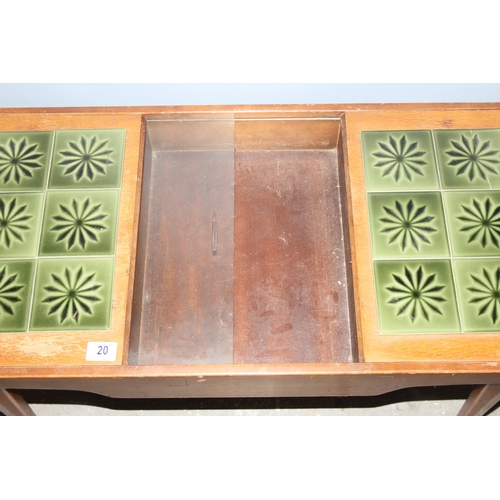 20 - A retro Lebus Link green tile topped coffee table with storage, approx 105cm wide x 43cm deep x 41cm... 