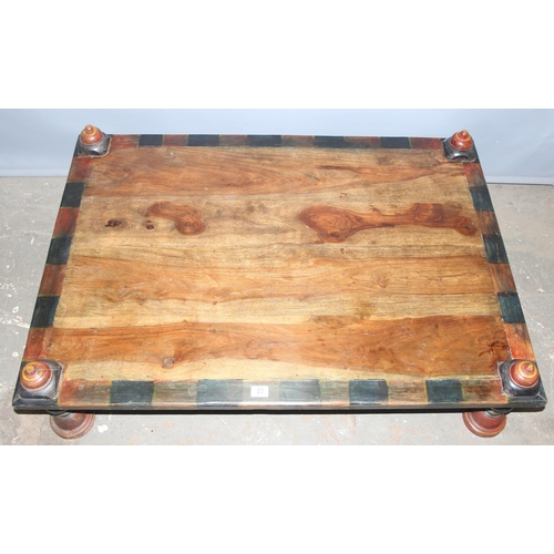 23 - A vintage Indian Charpoy coffee table with wooden inlay, approx 121cm wide x 88cm deep x 27cm tall