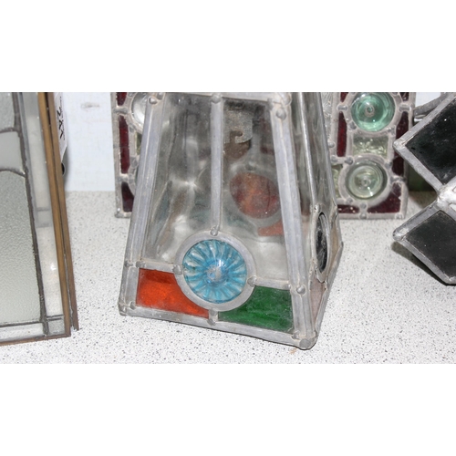 241 - 3 lead lined ceiling lamps and a qty of stained glass window panels