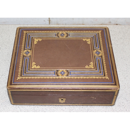 275 - Mahogany glovebox with mother of pearl inlay and a tooled leather writing box with inkwell