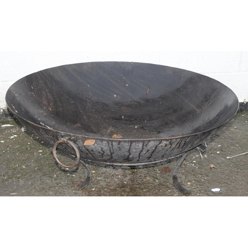 304 - A large garden fire pit or brazier on stand, approx 95cm in diameter