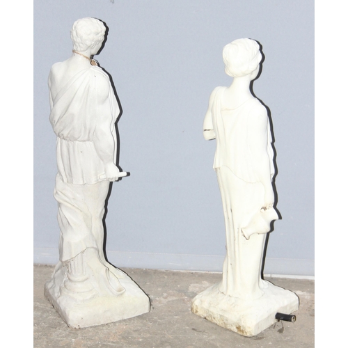 309 - 2 white marble effect garden statues of classical male and female figures, each approx 56cm tall