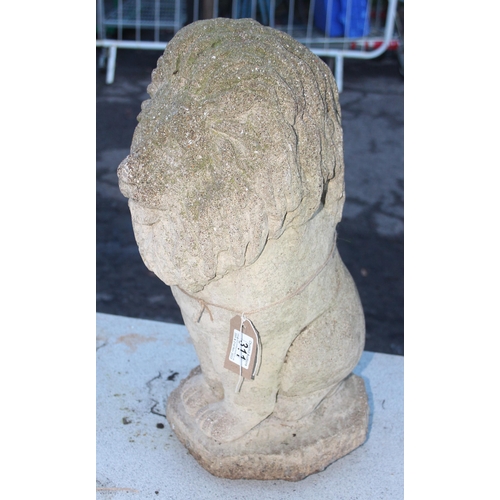 311 - A large weathered concrete garden lion statue, approx 52cm tall