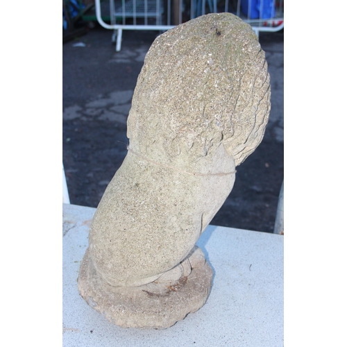 311 - A large weathered concrete garden lion statue, approx 52cm tall