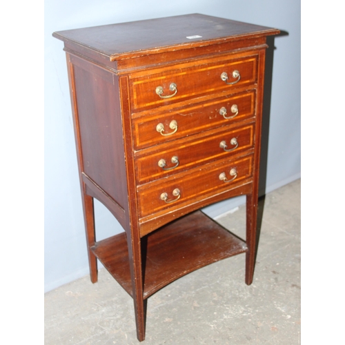 32 - An Edwardian 4 drawer chest on legs, previously a music cabinet but altered to make drawer fronts so... 