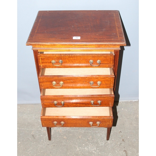 32 - An Edwardian 4 drawer chest on legs, previously a music cabinet but altered to make drawer fronts so... 