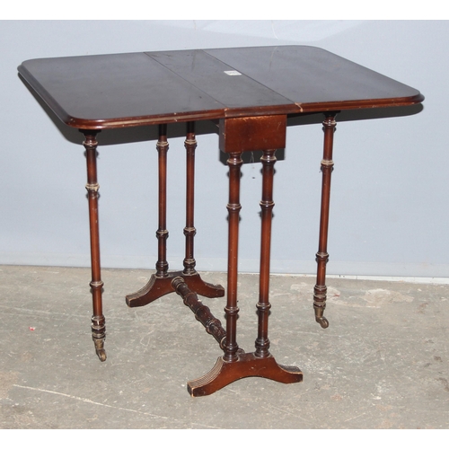 35 - An Edwardian mahogany Sutherland table, approx 69cm wide x 56cm deep x 57cm tall when open