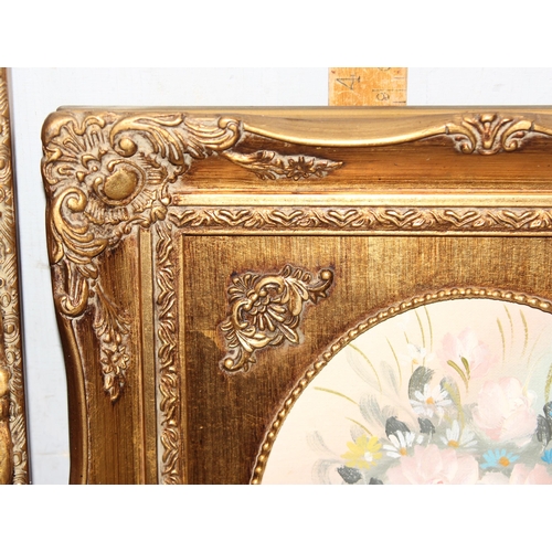 411 - 2 vintage decorative oil on board paintings of flowers, in impressive gilt frames, the largest appro... 