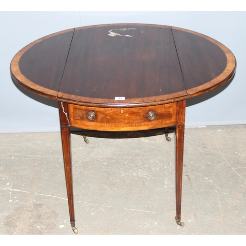 45 - A small Edwardian oval mahogany dropleaf table with drawer and crossbanded inlay, approx 96cm wide x... 