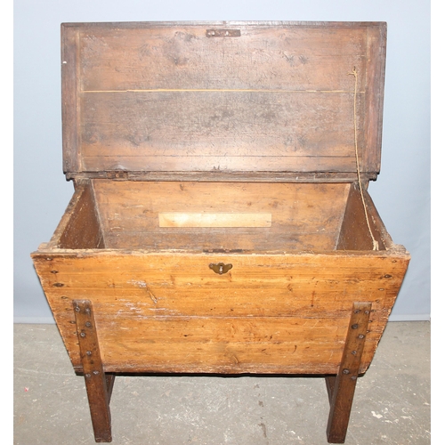 49 - An antique stained pine dough bin on legs, with lid, approx 103cm wide x 54cm deep x 78cm tall