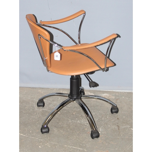 53 - A good quality retro style tan leather office chair