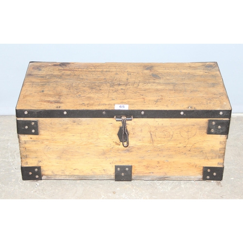 65 - A vintage pine and iron framed trunk, approx 62cm wide x 31cm deep x 26cm tall