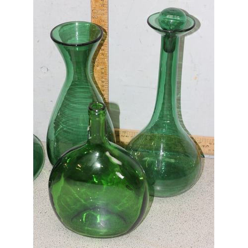 1708 - 8 assorted vintage green glass decanters, carafes, bottles etc