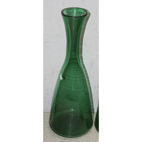 1708 - 8 assorted vintage green glass decanters, carafes, bottles etc