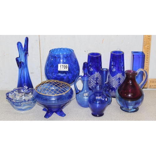 1709 - Qty of assorted vintage blue glass items to inc vases, jugs etc