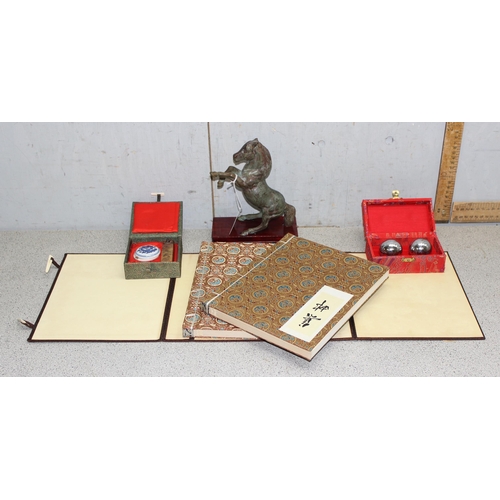 1719 - Mixed Oriental lot to include stamp albums and a brass horse on stand