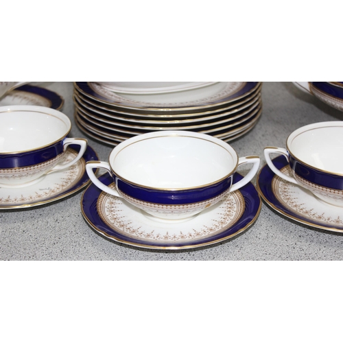 1723 - Large Royal Worcester 'Regency' dinner service with cobalt blue & gold gilt decoration