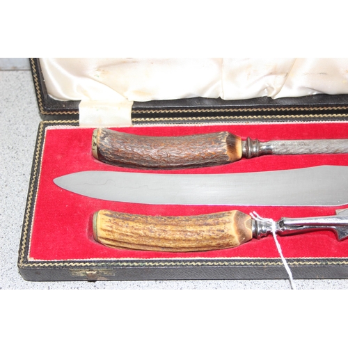 1078 - A vintage boxed 3 piece carving set with antler handles, ideal for Christmas Dinner!