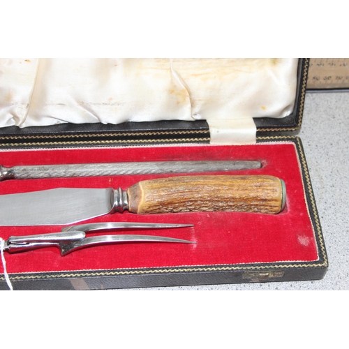 1078 - A vintage boxed 3 piece carving set with antler handles, ideal for Christmas Dinner!