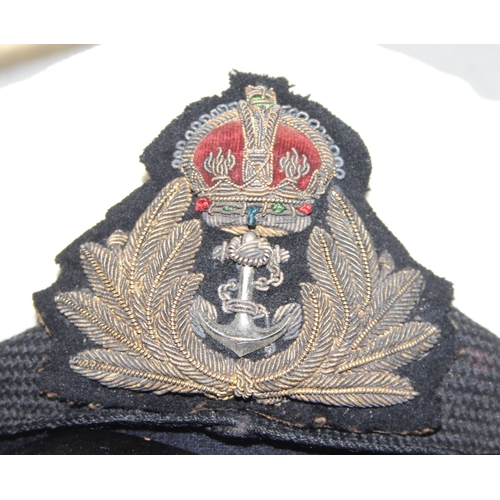 1423 - A c.WW2 period naval cap named to Rutherford by Gieves, rank of 2nd class Commodore, Captain or Comm... 