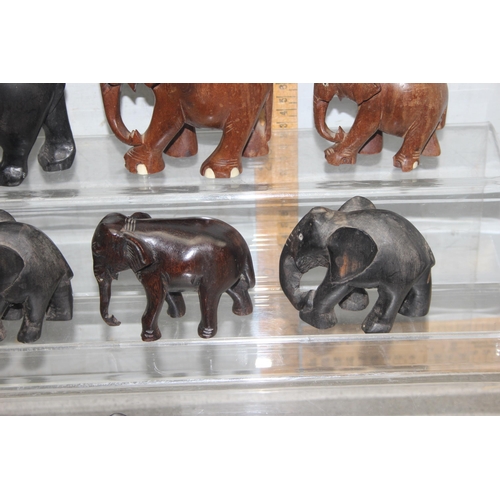 1807 - 10 assorted wooden and other animal figures to inc 8 Elephants, a wooden Rhino and a Papier Mache to... 