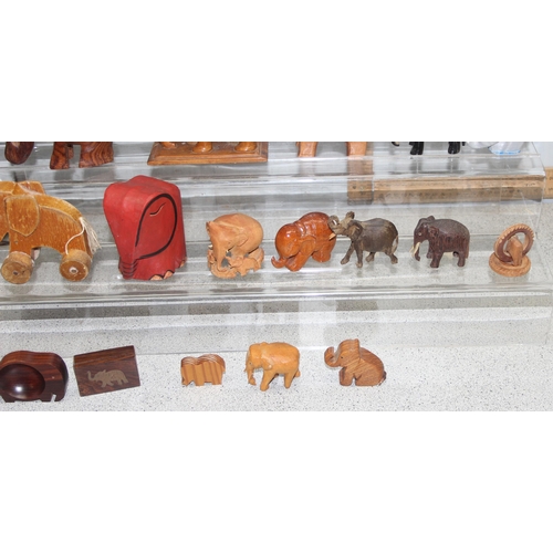 1816 - Qty of carved wooden elephant models