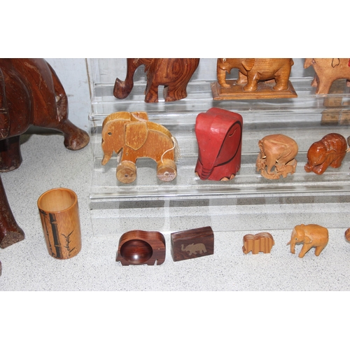 1816 - Qty of carved wooden elephant models