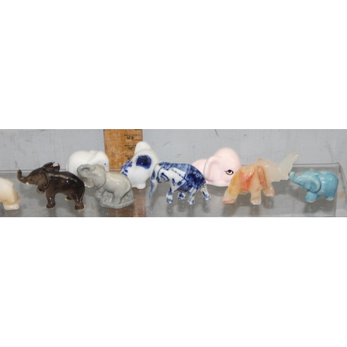 1817 - Qty of porcelain and other small elephant figures