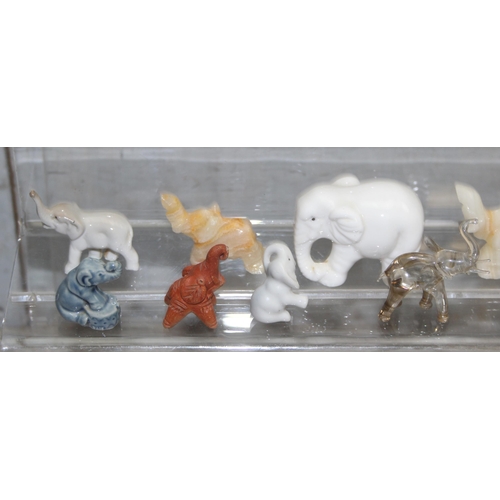 1817 - Qty of porcelain and other small elephant figures