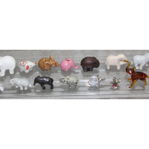 1817 - Qty of porcelain and other small elephant figures