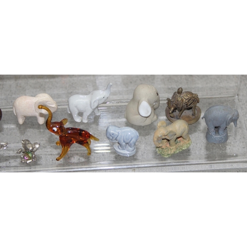 1817 - Qty of porcelain and other small elephant figures