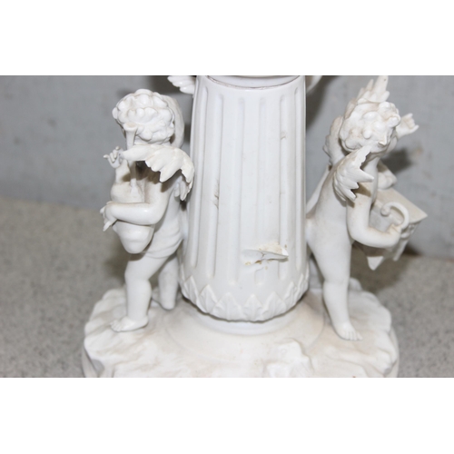 252 - A pair of antique Parianware porcelain candlesticks later converted into lamps, decorated with cheru... 