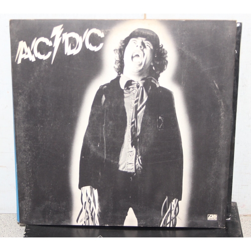 634 - Qty. of vinyl LP's & 12 inch singles to include AC / DC, Kiss & Sid Vicious