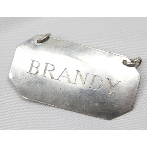 1085 - An extremely rare late 18th or early 19th century silver decanter label for Brandy with gilt back, i... 