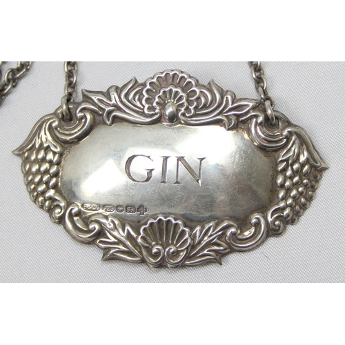 1087 - A highly decorative silver decanter label for Gin, Birmingham 2000 by Broadway & Co, approx 60mm wid... 