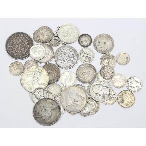 1241 - Qty of assorted mixed World and British silver coins to include an 1865 Gothic Florin, a 1942 Walkin... 