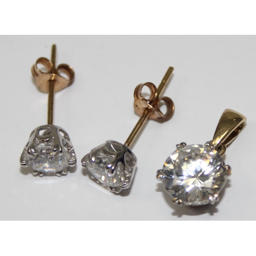 2393 - A 9ct gold and white stone pendant with matching stud earrings, all marked 375 and XRF confirmed, ap... 