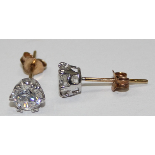 2393 - A 9ct gold and white stone pendant with matching stud earrings, all marked 375 and XRF confirmed, ap... 