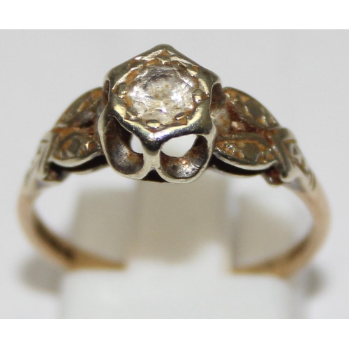 2412 - A vintage 9ct gold and solitaire white stone ring in decorative mounting, London 1976, approx size O... 