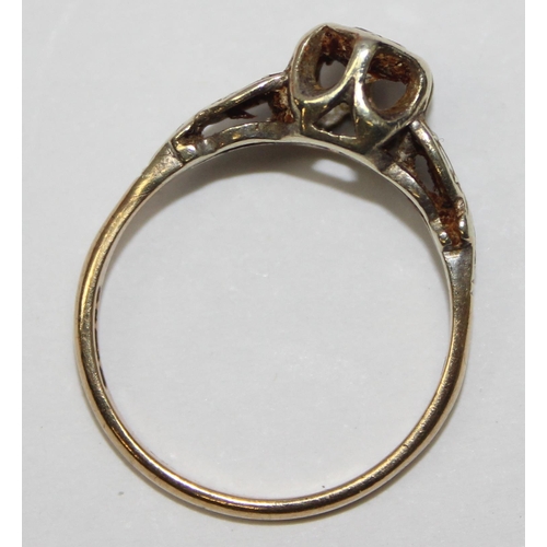 2412 - A vintage 9ct gold and solitaire white stone ring in decorative mounting, London 1976, approx size O... 