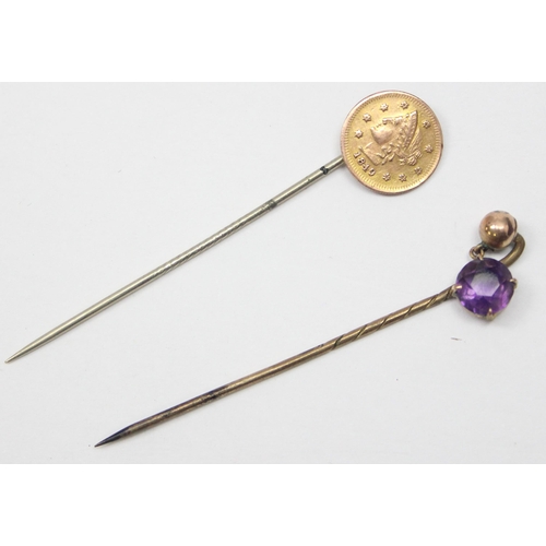 2438 - 2 vintage 9ct gold mounted stick pins, one with amethyst drop and the other formed as a US coin, bot... 